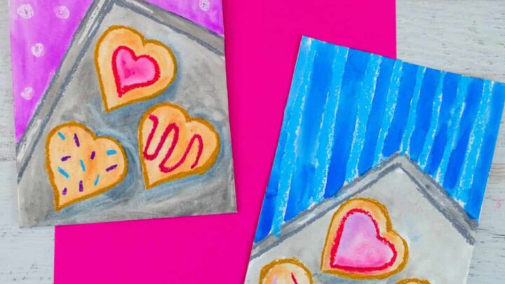 Valentine's Day cookie art project using watecolor paint and oil pastels easy art activity for elementary school.